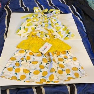 Pat Pat baby girls lemon summer dresses. Never worn with tags. Size 6-9M.